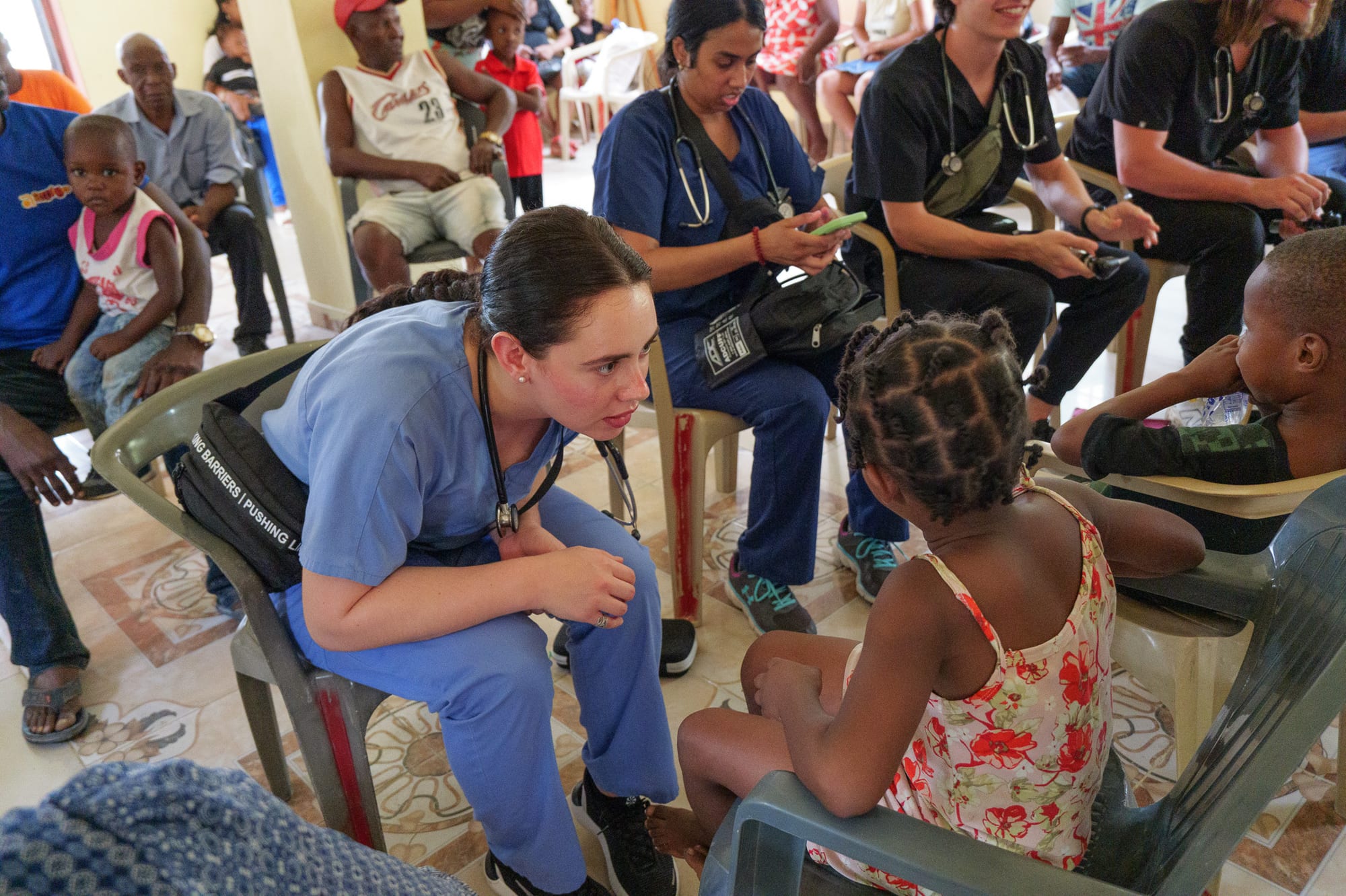 A Medicine in Mission clinician caring for a patient in the field